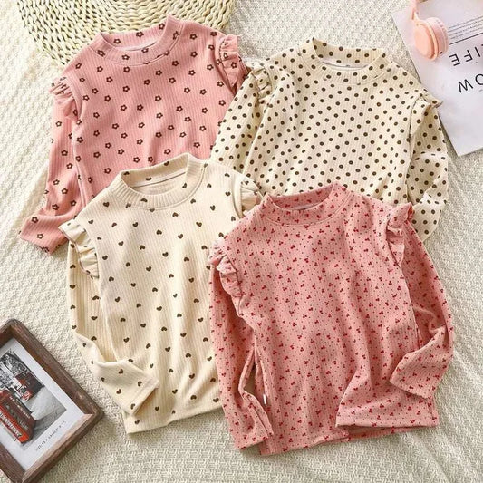 Set of four spring girl children long-sleeve ruffle collar cotton tees with polka dot and floral prints in pink, beige, and cream colors