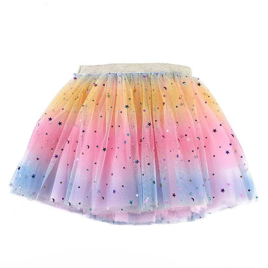 Colorful girl's rainbow tulle skirt with star and moon patterns, suitable for ages 1-8 years.