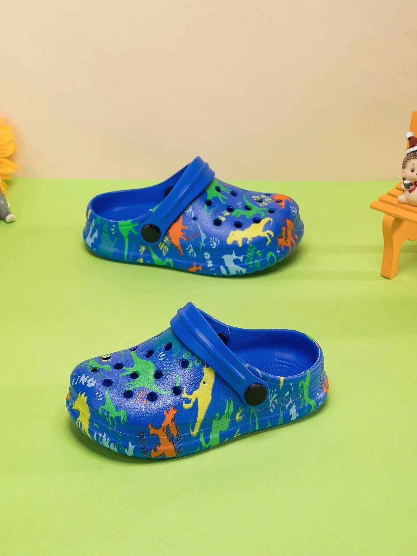 Blue boys summer sandals with colorful dinosaur patterns and adjustable heel straps for outdoor and beach wear