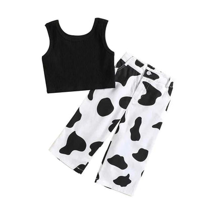 Kids girls summer outfit with black ribbed sleeveless tank top and white elastic cow print pants set