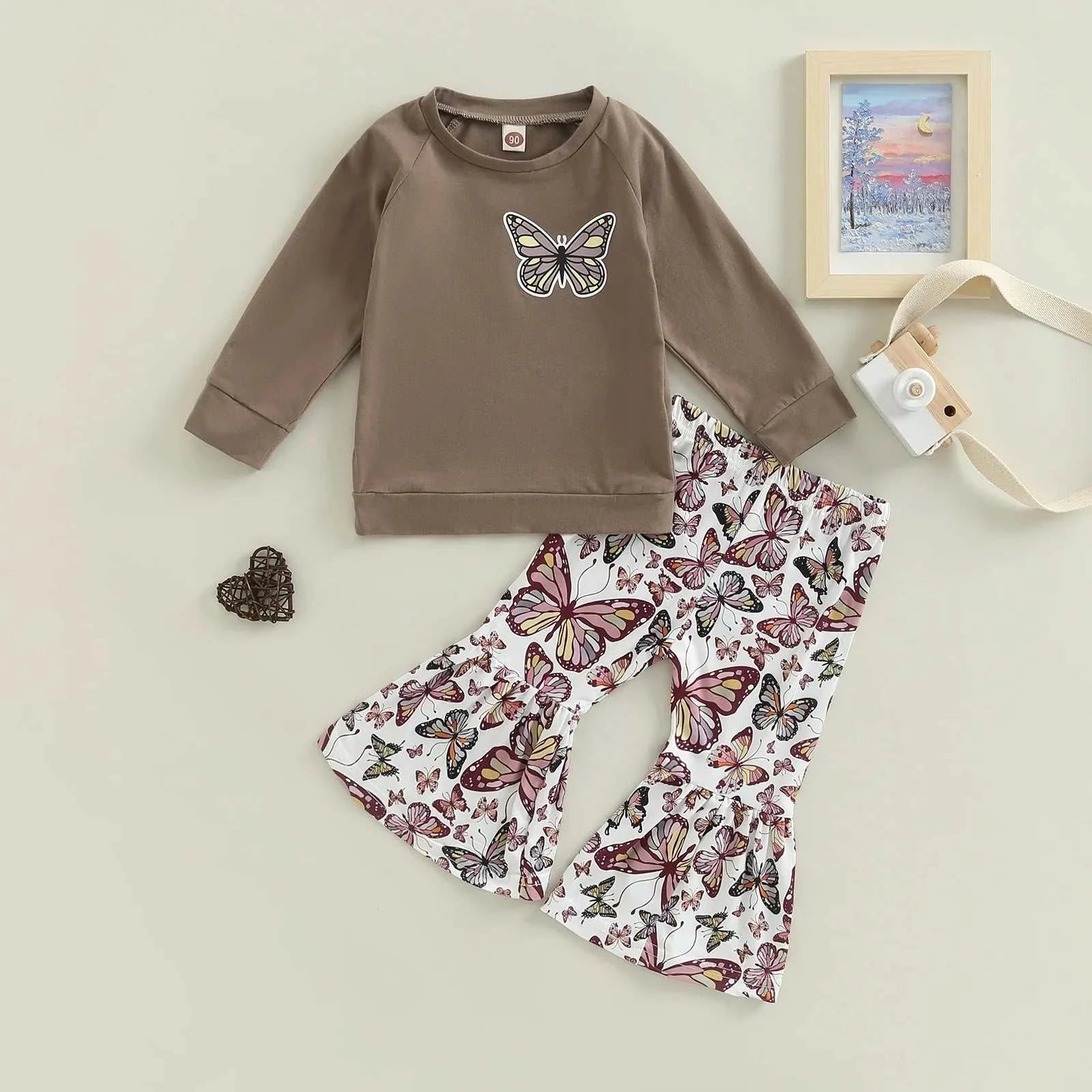 Kids girls fall outfits with brown long sleeve butterfly print top and white flare pants with colorful butterfly patterns