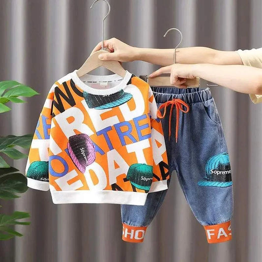 Children's two-piece top and bottom clothes set with colorful printed sweatshirt and blue pants for boys and girls.