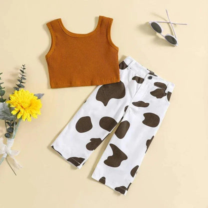 Kids girls summer outfit with a ribbed sleeveless brown tank top and white elastic cow print pants set
